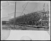 Starboard side of BYMS-30 being built.  New Bern, nc.  Barbour boat works.  Photos attached to glass